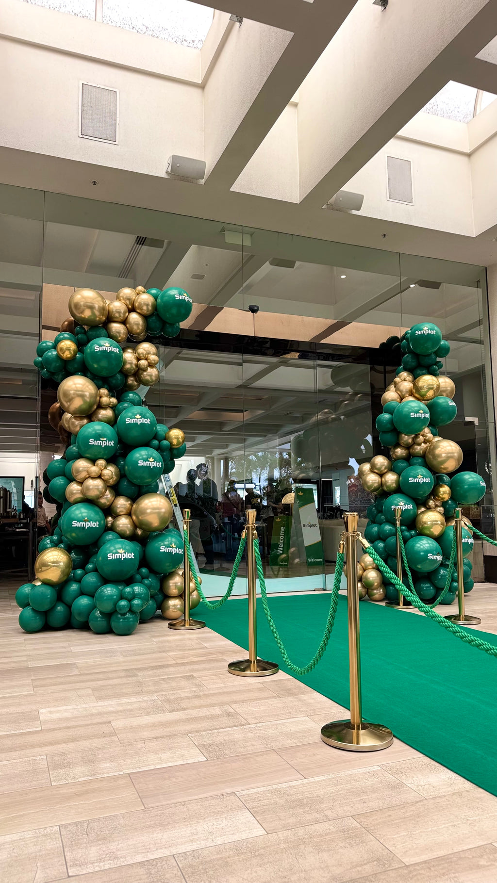 Grand Entrance Branded balloon garland with corporate logos