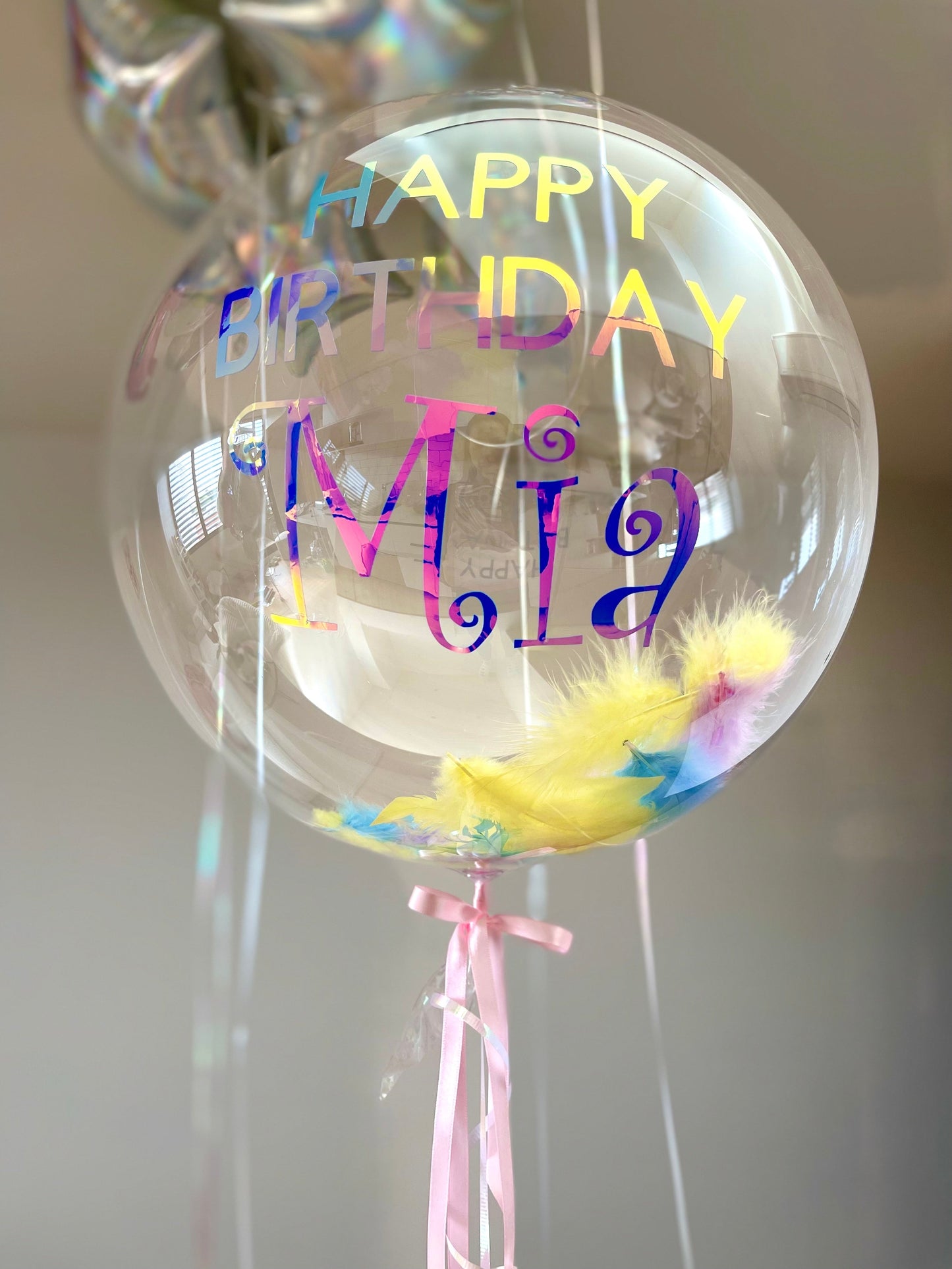 Small personalised balloon with Colourful feathers